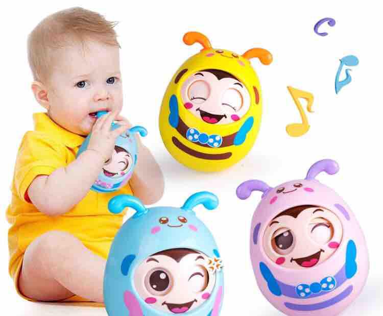 Con lật đật phát nhạc chớp mắt, gặm nướu cho bé