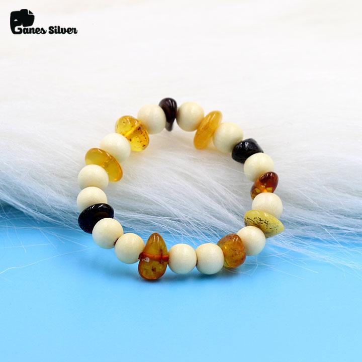Vòng tay trẻ em đẹp, vòng tay trẻ em cao cấp, vòng tay trẻ em chất liệu cao cấp,vòng dâu đá hổ phách trẻ em chất liệu bạc ta cao cấp – ganes silver