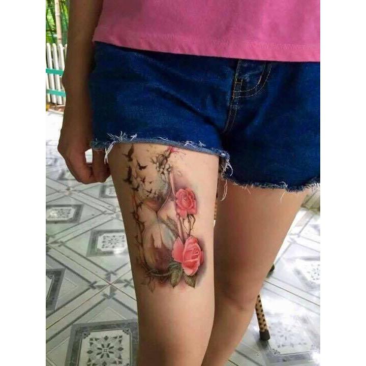Hình xăm dán bắp tay đồng hồ hoa
