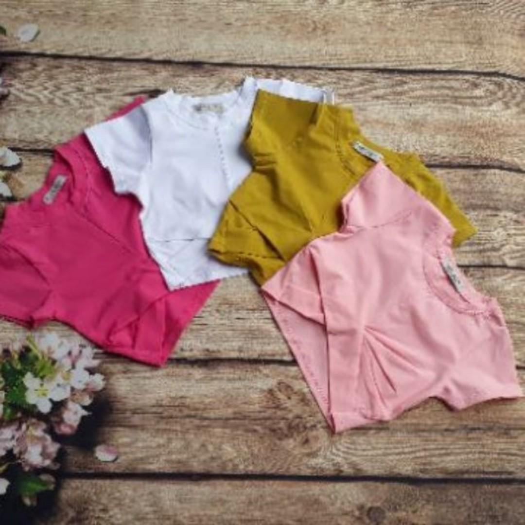 Áo croptop xoắn eo bé gái
