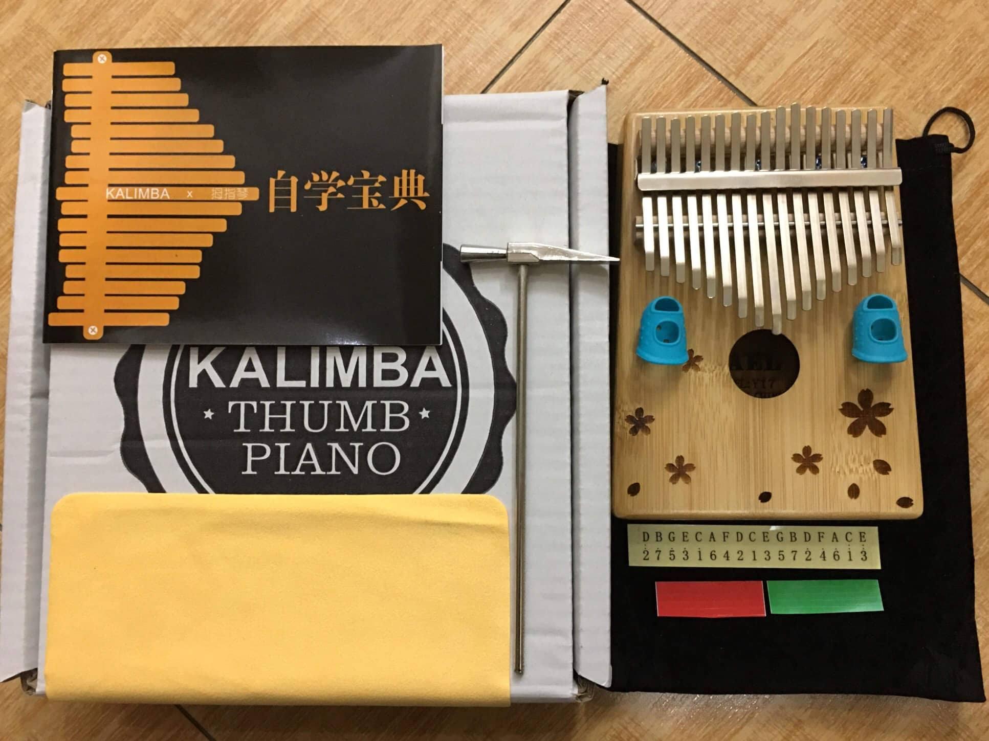 Đàn Kalimba YAEL cao cấp Gỗ tròn hoa full phụ kiện - Thumb Piano  - HÀNG CÓ SẴN.