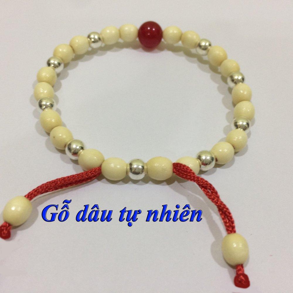 Vòng dâu trừ tà cho bé gái 9 bi bạc 1 đá phong thủy
