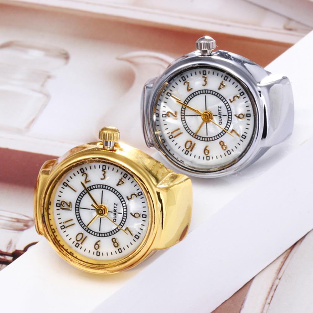 ภาพประกอบของ หน้าปัดนาฬิกาควอทซ์อะนาล็อกสร้างสรรค์เหล็กเย็นยืดหยุ่นควอตซ์นาฬิกาแหวนนิ้ว
