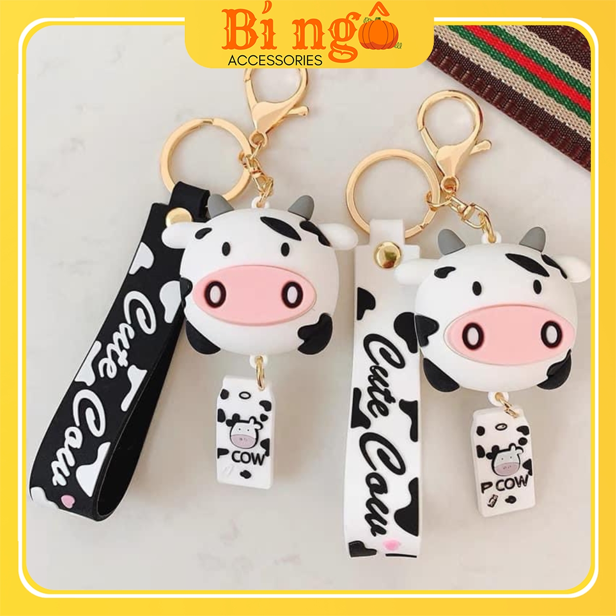 Móc khoá nhựa dẻo đầu bò sữa cute cow - bí ngô - mk011