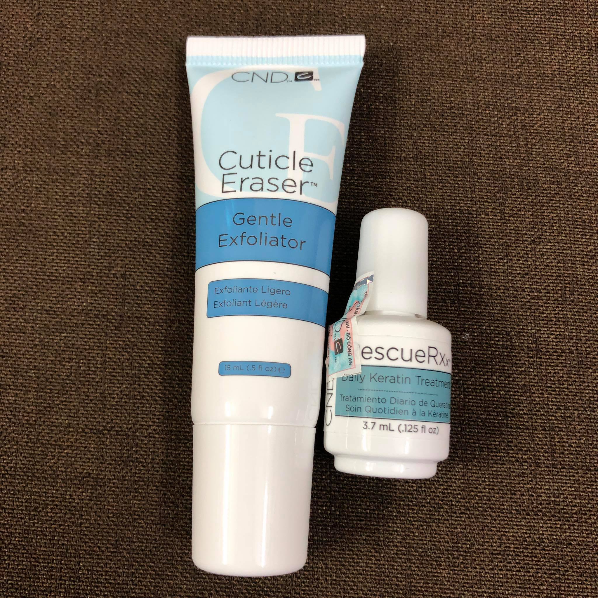 Bộ đôi dưỡng phục hồi móng CND RescueRxx và Tẩy da chết tạo độ ẩm Cuticle Eraser