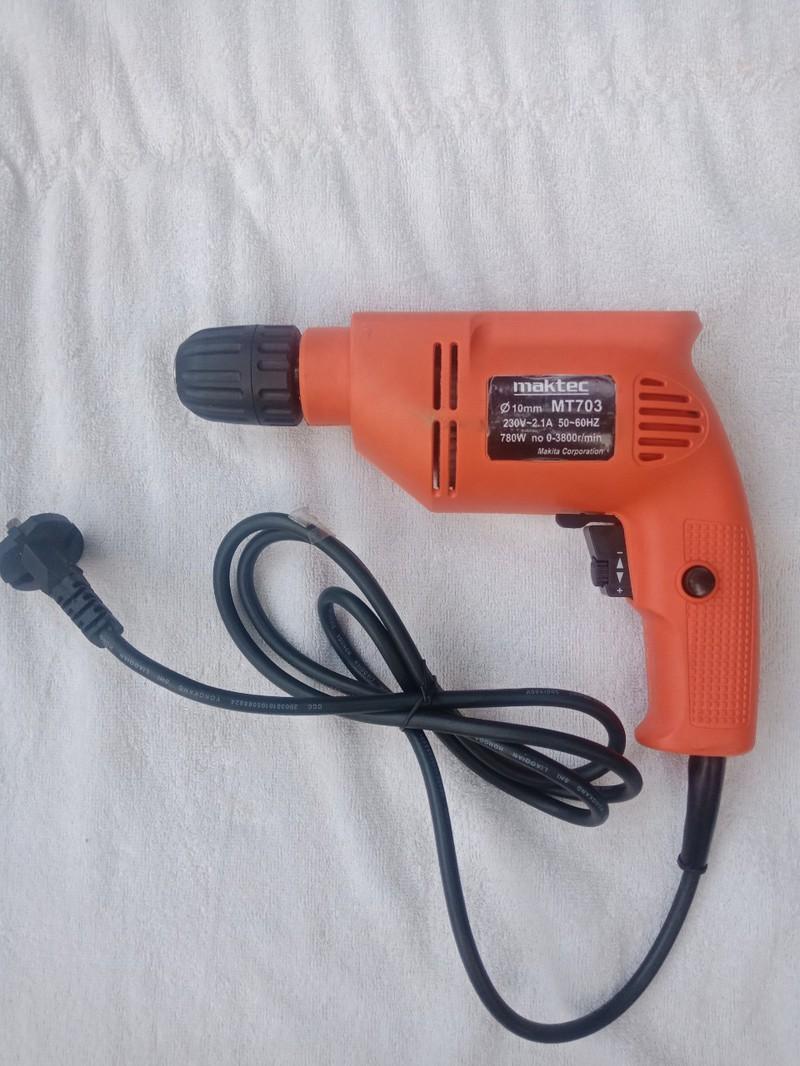 Máy khoan maktec mt-703