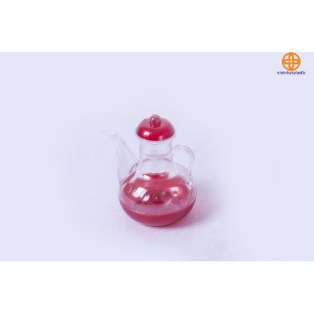 Vịt mắm, lọ đựng dầu, nước mắm có vòi