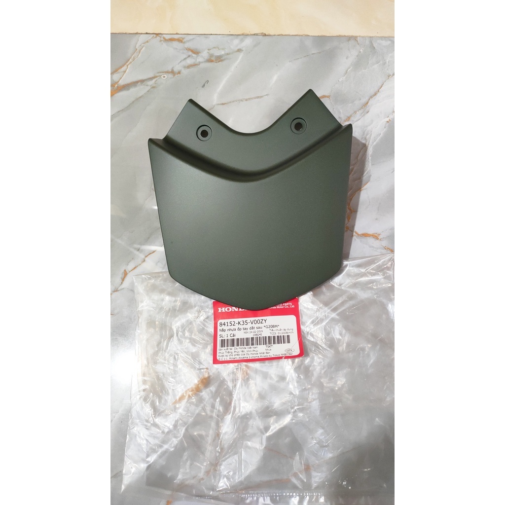 Nắp nhựa ốp tay dắt sau honda pcx 125 năm 2014-2015 màu xanh lục.
