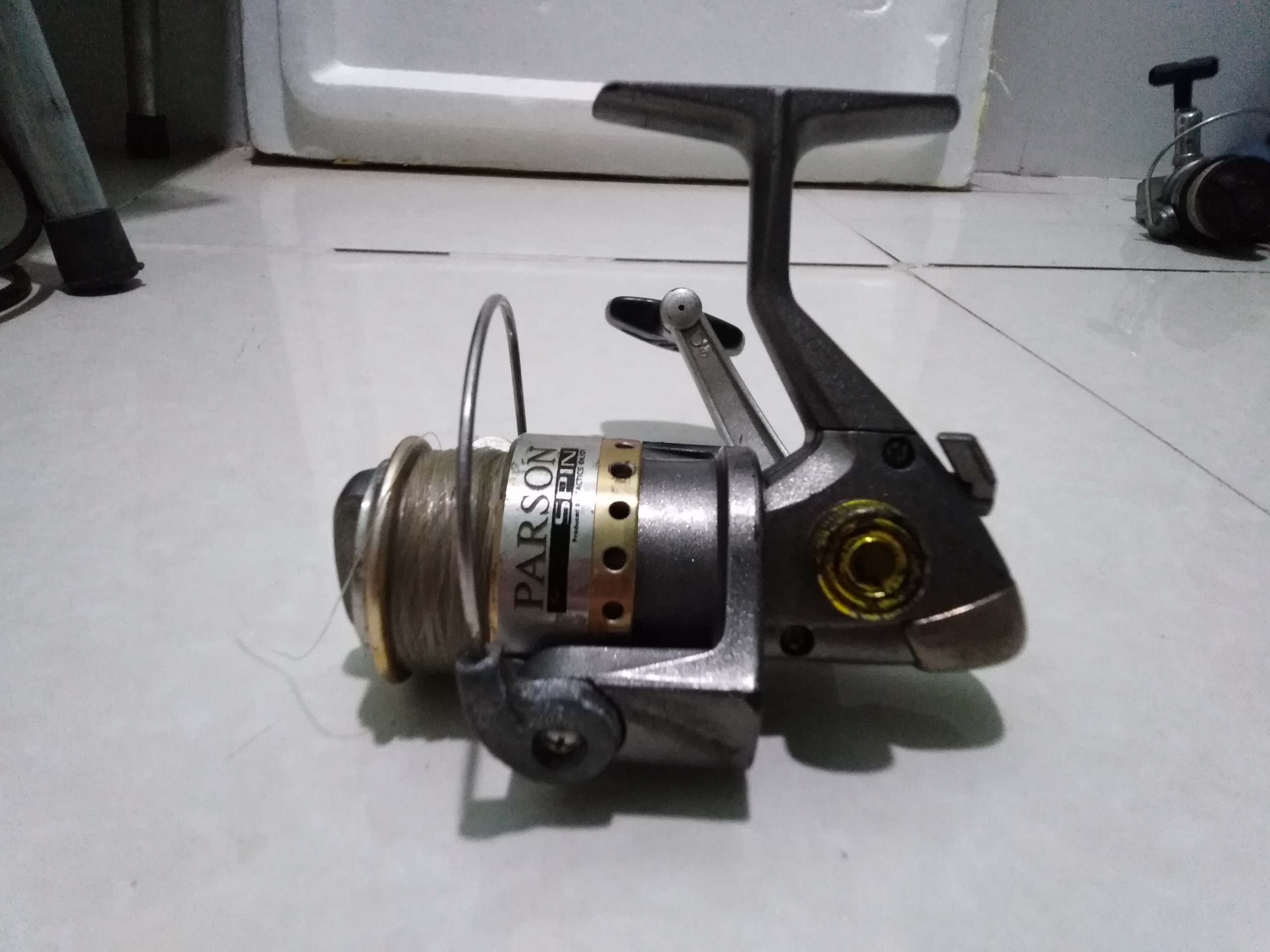 Máy câu bãi nhật parson spin 2000 cối kim loại