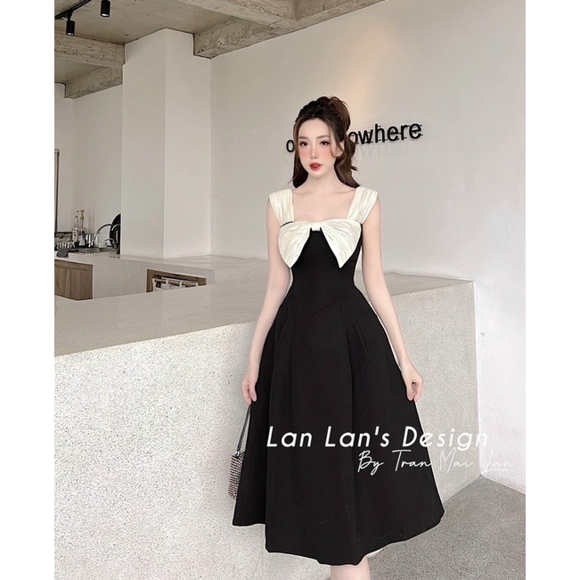 Đầm đen xoè phối nơ xinh to12