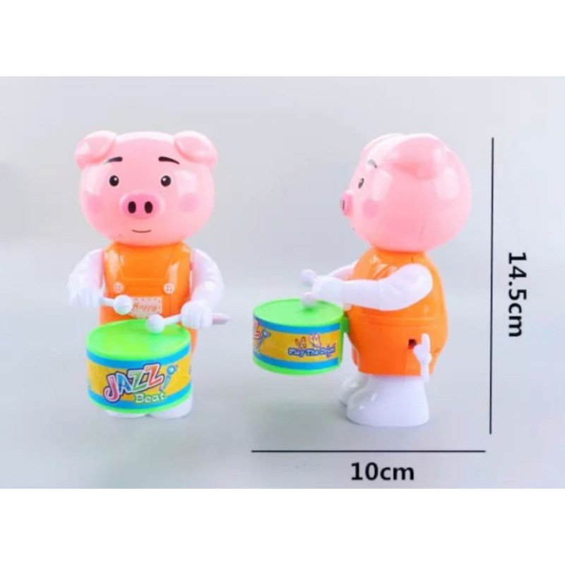 Heo đánh trống vặn cót đồ chơi cho bé