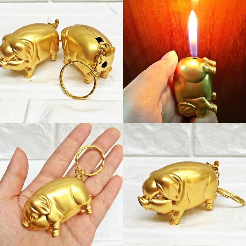 Bật lửa móc khóa hình con heo vàng -