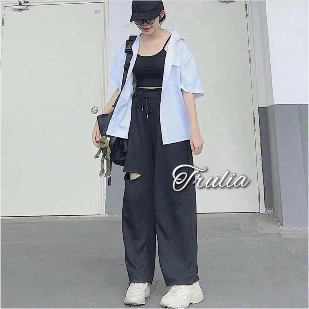 Quần ống rộng rách đùi lai tưa hai màu cá tính