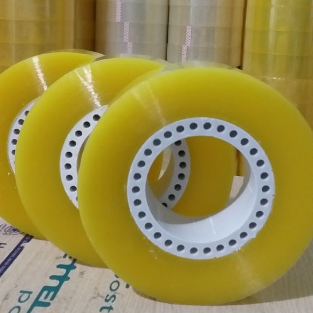 Băng dính/băng keo opp 1kg/cuộn lõi lỗ đục/trong/vàng
