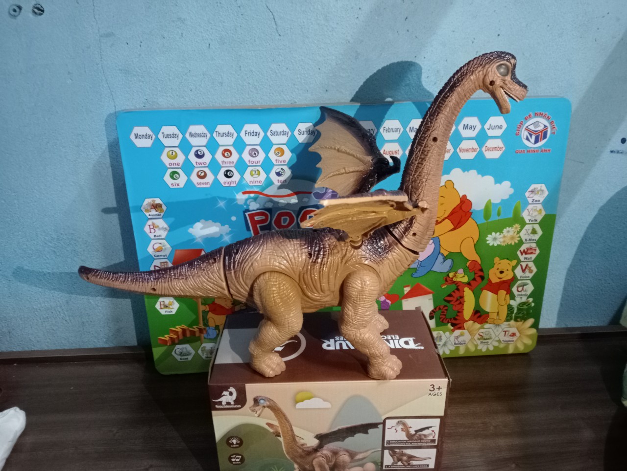 Đồ chơi khủng long cổ dài đẻ trứng có nhạc và đèn