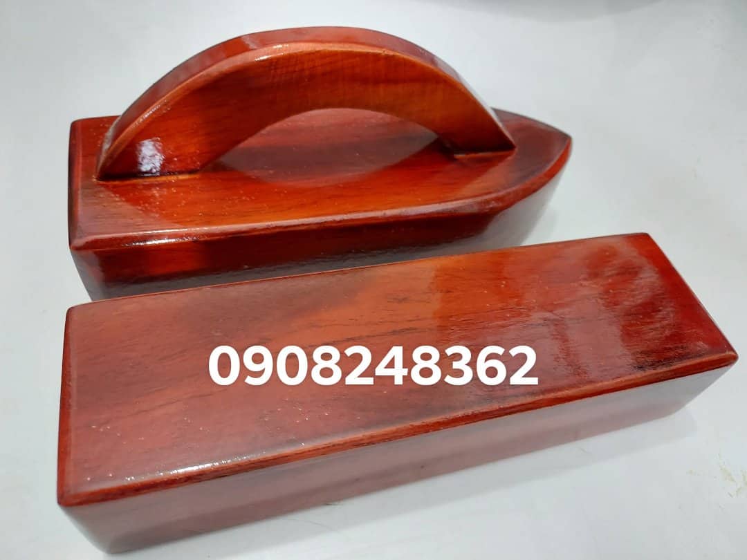 Cục gỗ ủi quần ao