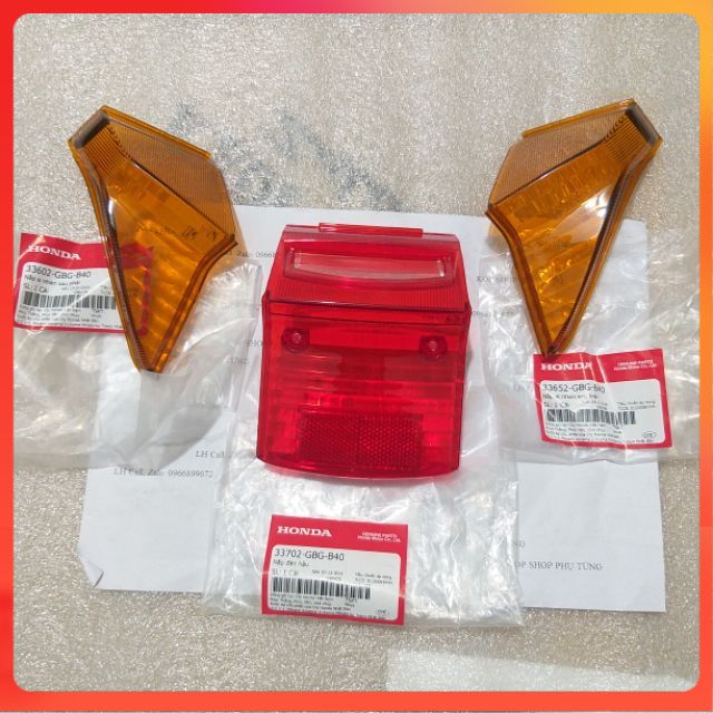 Bộ vỏ đèn hậu xi nhan xe super DREAM chính hãng honda việt nam _