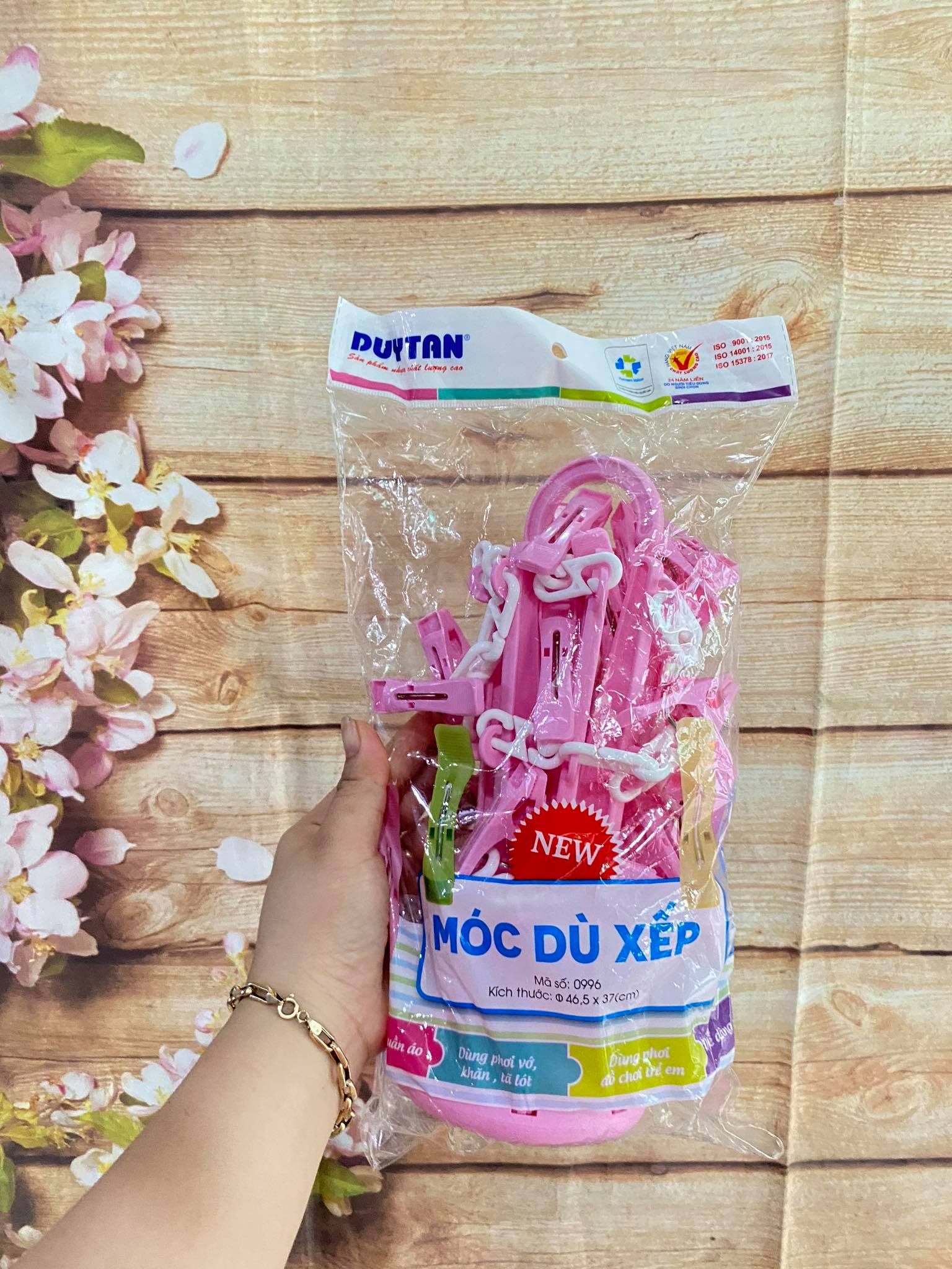 Móc dù xếp nhựa duy tân hkm anmum