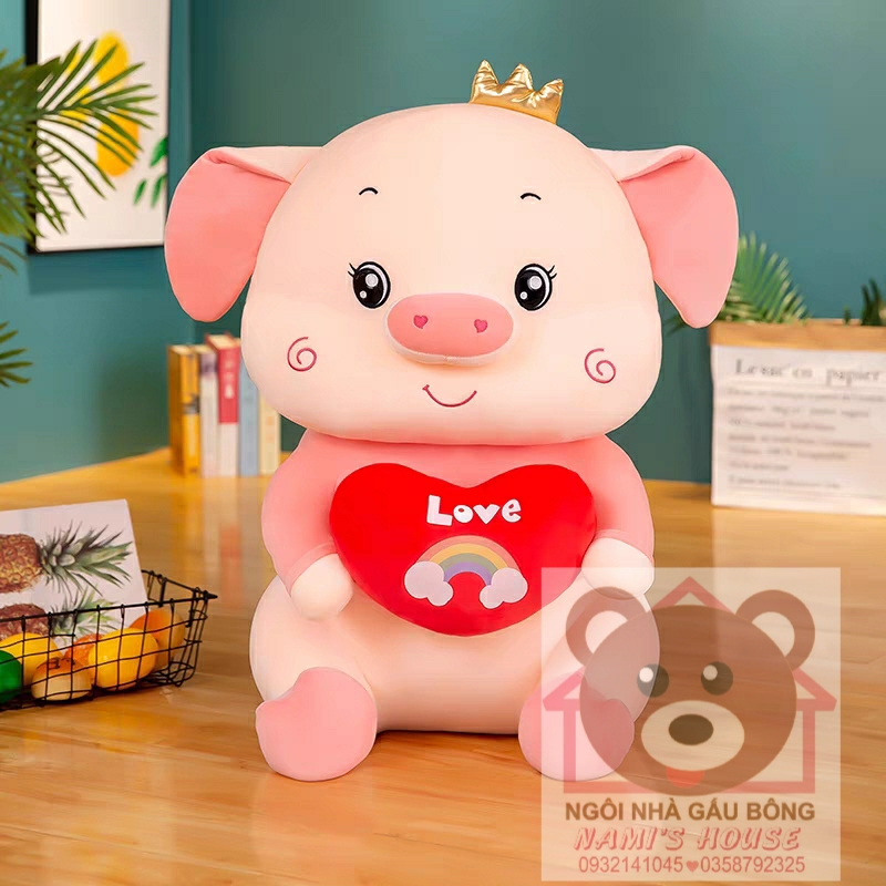 Gấu bông heo ôm tim - thú nhồi bông heo ôm tim