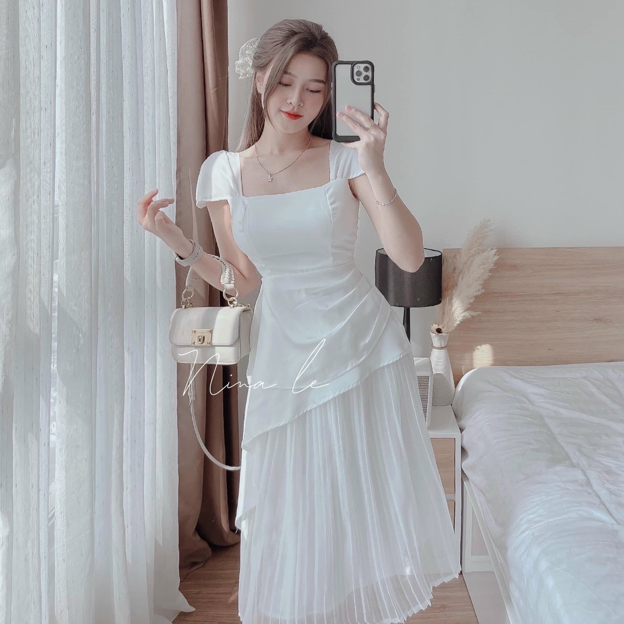 Set áo vạt chéo tà có mút và chân váy dập ly có mút