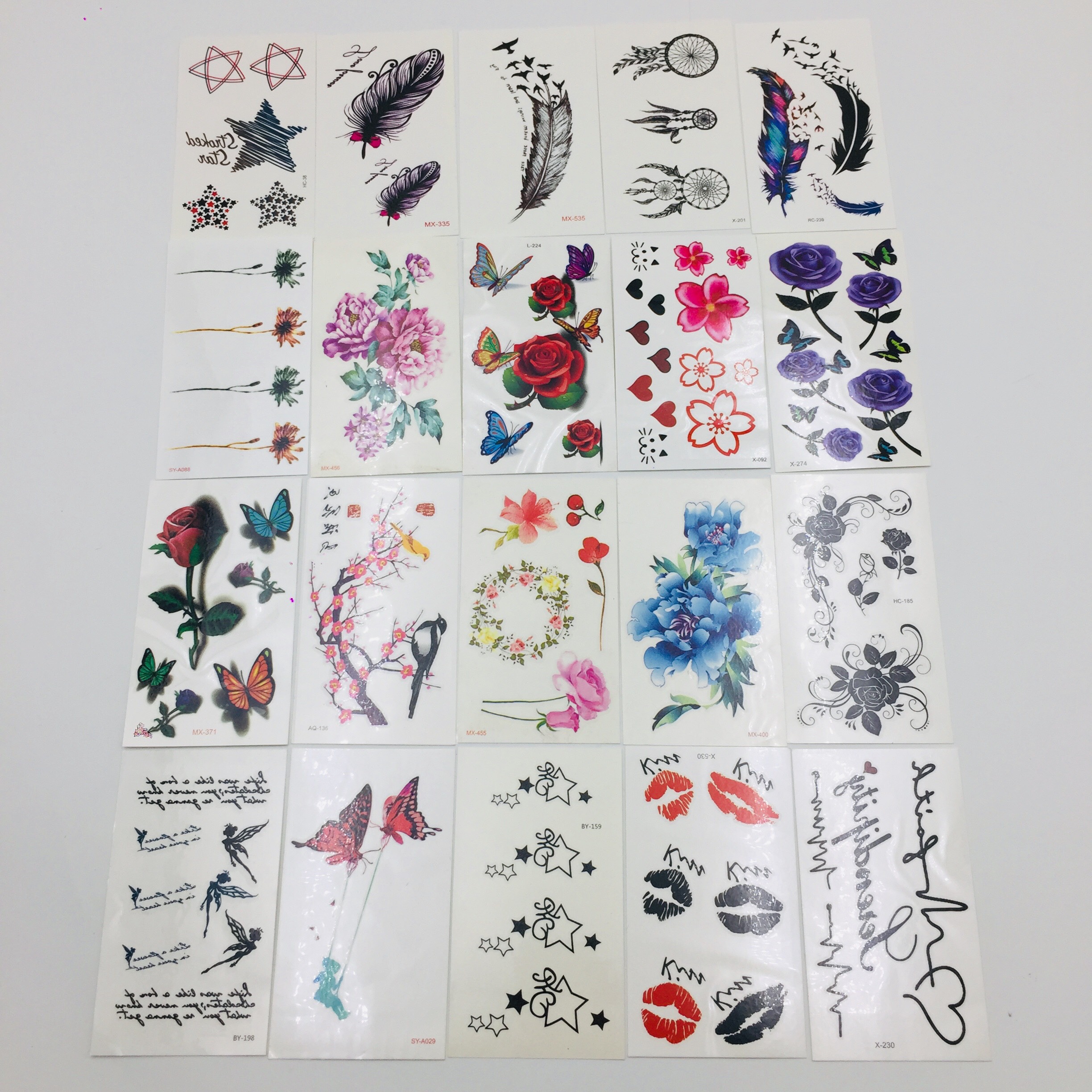 Combo 20 tấm dán mini hoa hồng, chữ, cô tiên, cành đào, con chim, con bướm, ngôi sao, hoa mẫu đơn, lông vũ, nhịp tim,...