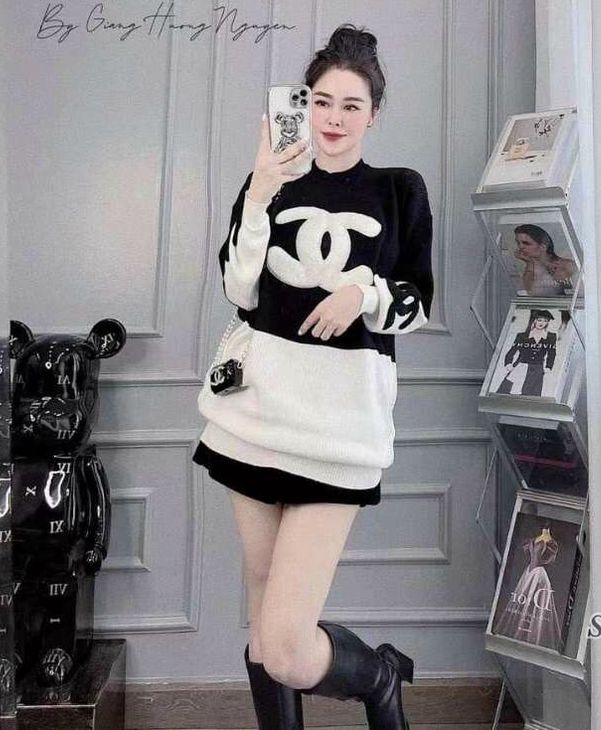 Áo len đen trắng chữ X sành điệu