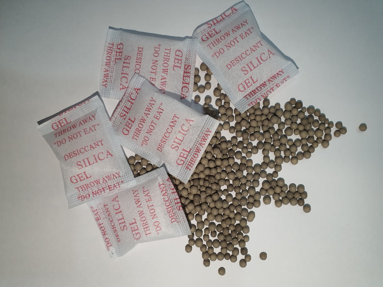 [HCM]Đóng gói túi 1kg hạt hút ẩm. hạt chống ẩm gói hút ẩm Clay - Đất sét hoạt tính loại 5g/10g/20g