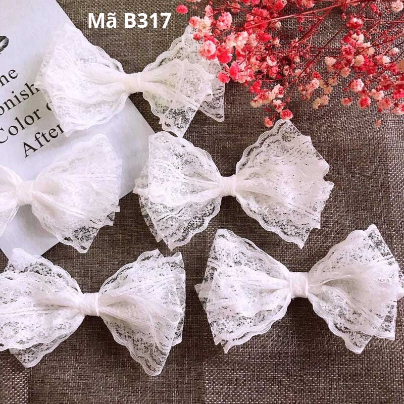B317 - cặp tóc nơ ren nhiều tầng