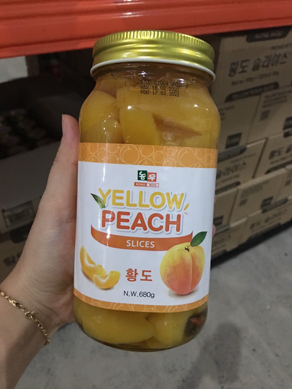 Đào vàng ngâm nongwoo hũ 680g hàn quốc