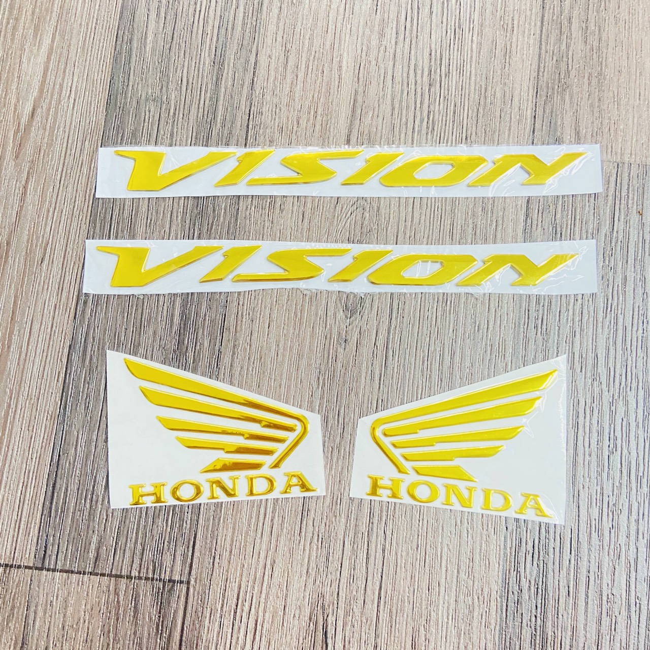 [HCM][COMBO VISION] TEM LOGO CHỮ VISION KẾT HỢP CÁNH CHIM HONDA NHỰA DẺO BÓNG CAO CẤP (MÀU VÀNG)