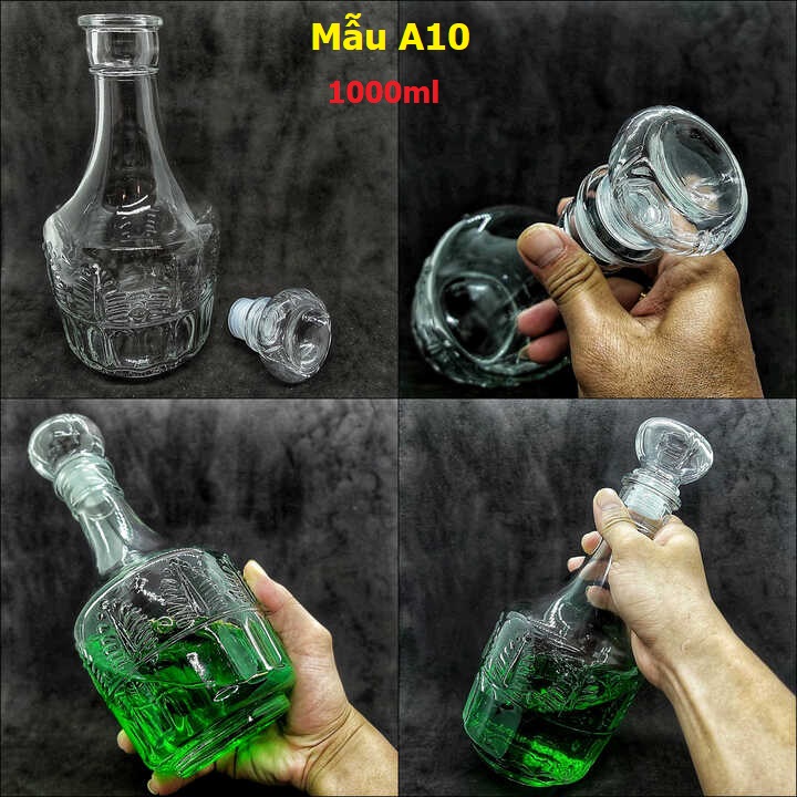 Chai đựng rươu thủy tinh 1000ml trong suốt - trụ tròn họa tiết lá nổi - vỏ chai rươu sang trọng trong suốt - kiểu a10
