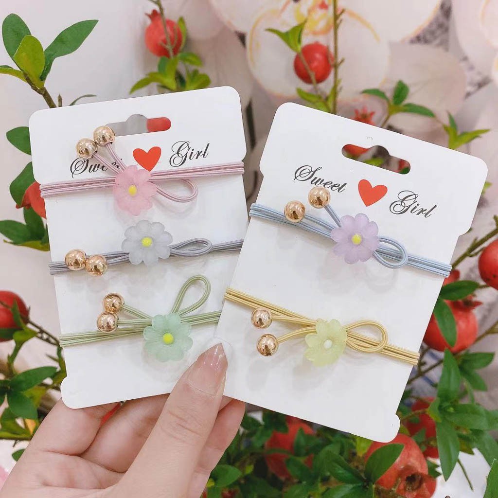 Dây buộc tóc hoa cúc 2 hạt châu vàng buta ct20