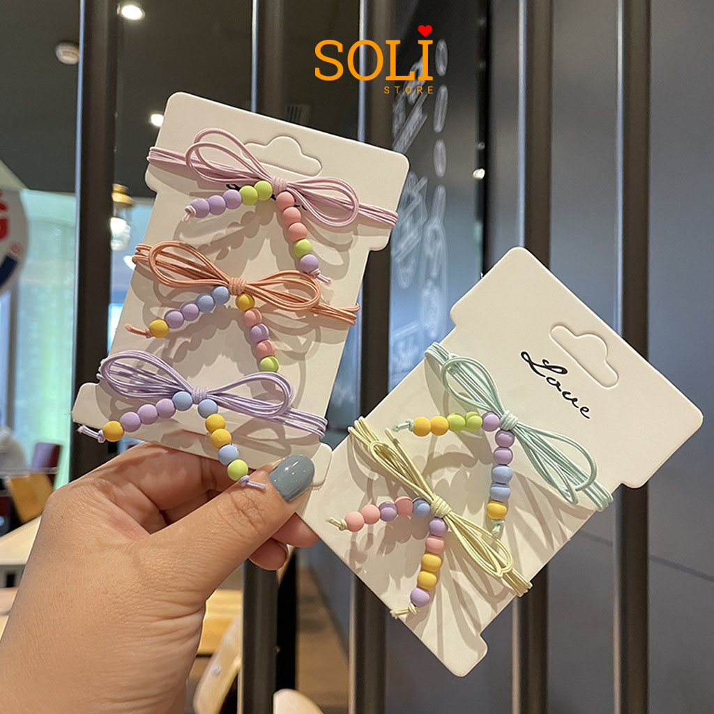Dây cột tóc nơ hạt màu ct35