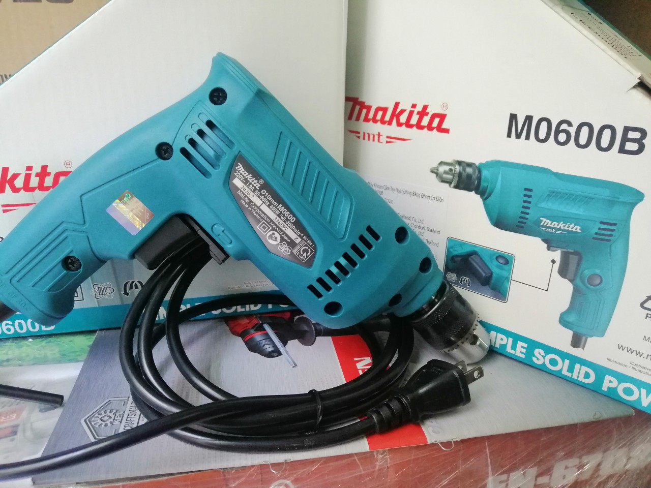 Máy khoan 10mm makita m0600b