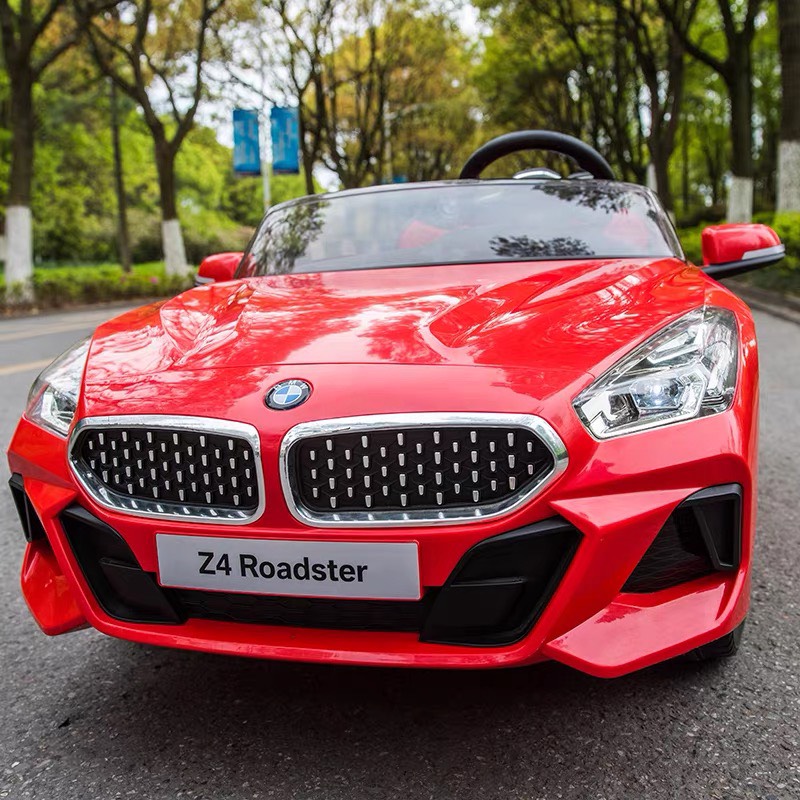 Ô tô điện trẻ em BMW Z4 Roadster 2 chỗ kết nối bluetooth 2 quạt gió có nhún