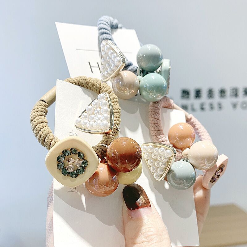 Dây cột tóc nữ tam giác 3 bi