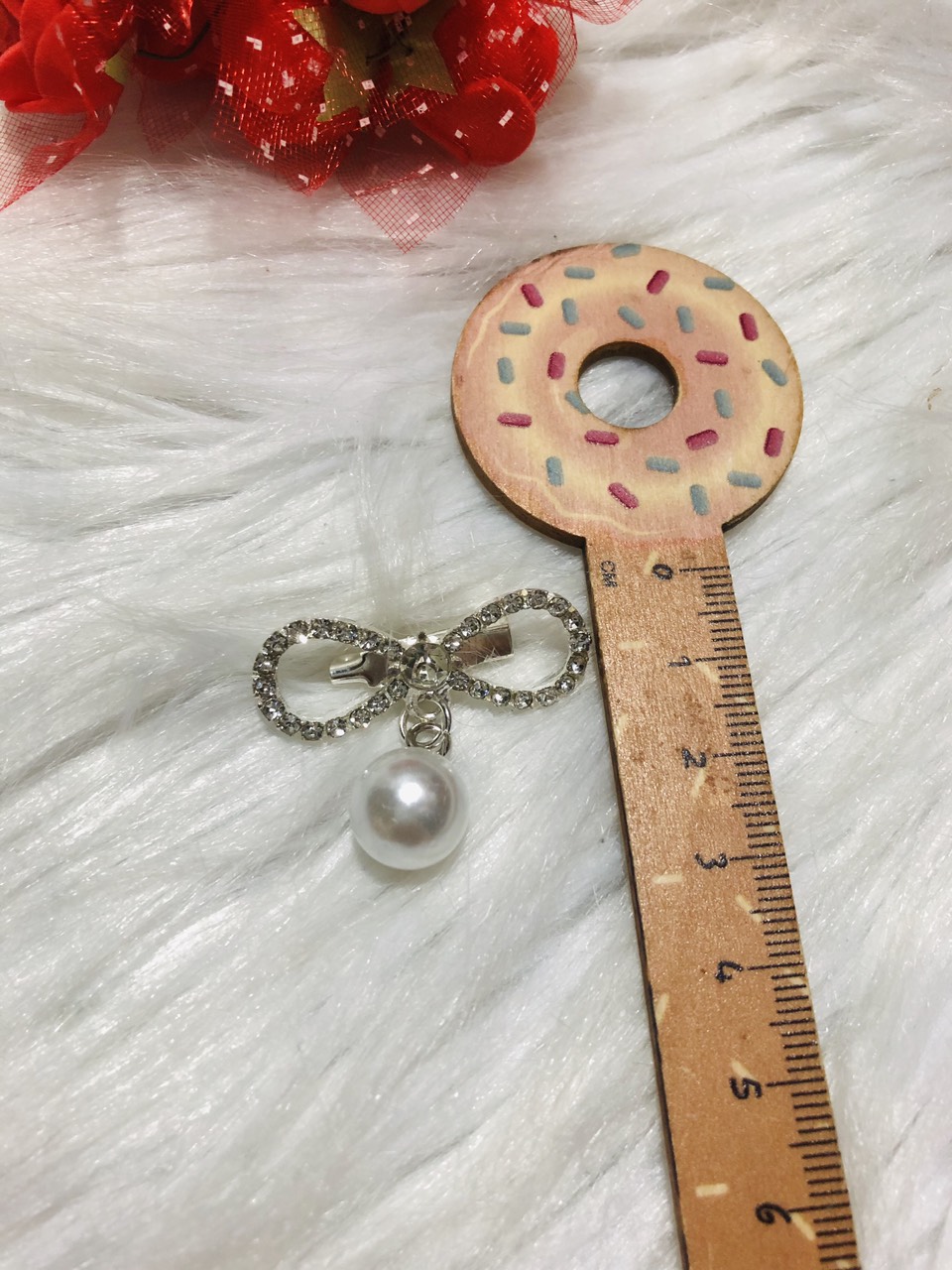 Cài áo nơ đính đá . kt 3 x 3cm