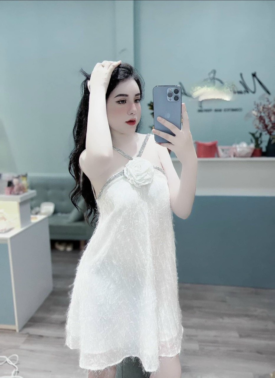 Đầm nữ lông vũ phối hoa hồng