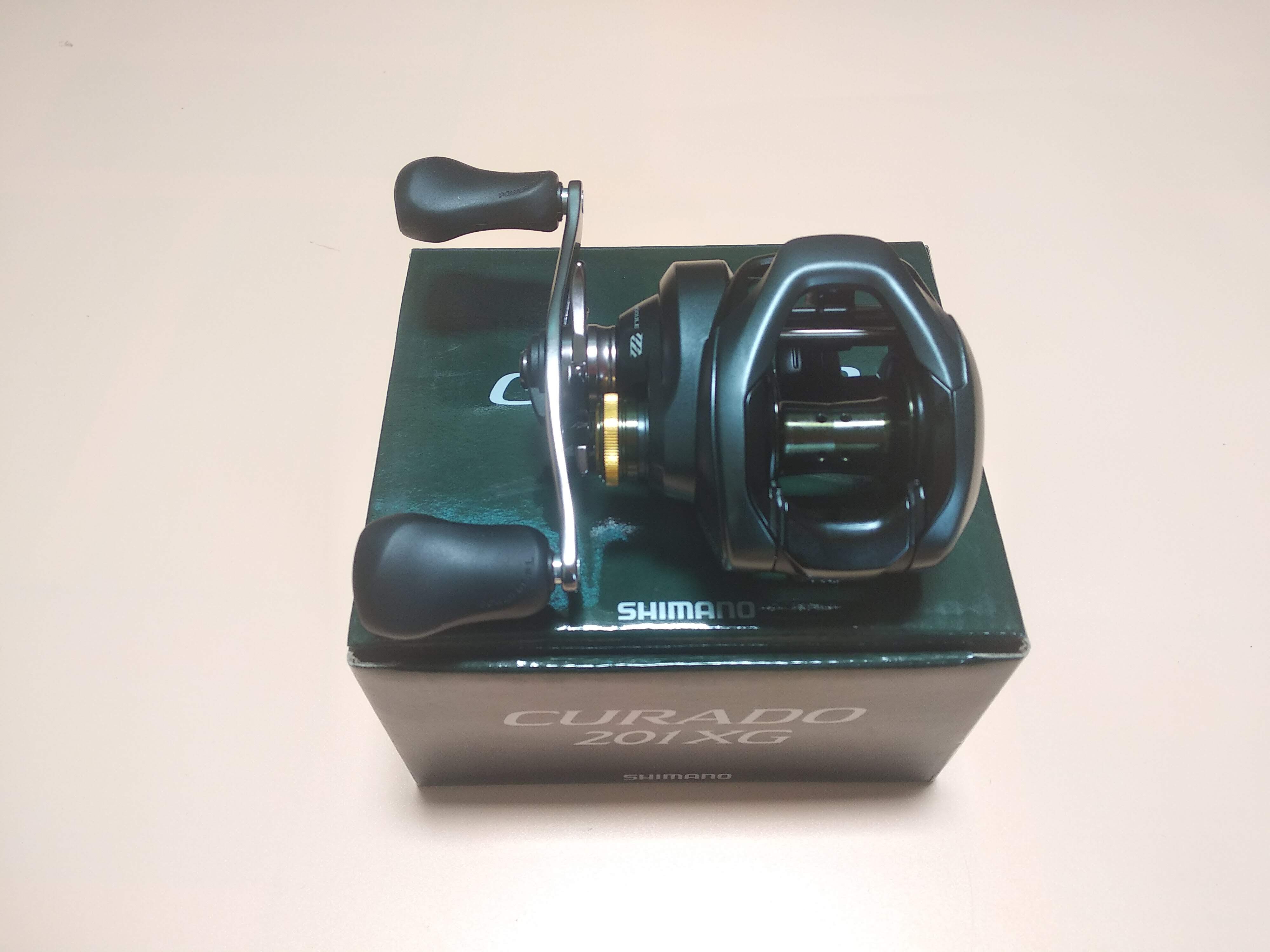 Máy câu cá shimano curado k 201xg - máy ngang - tay trái
