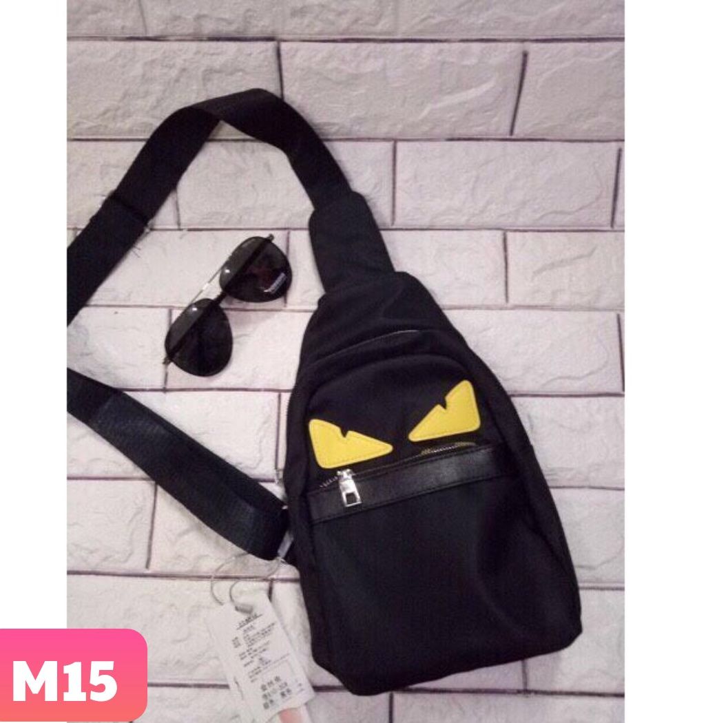 Túi chéo fendi hai mắt vàng