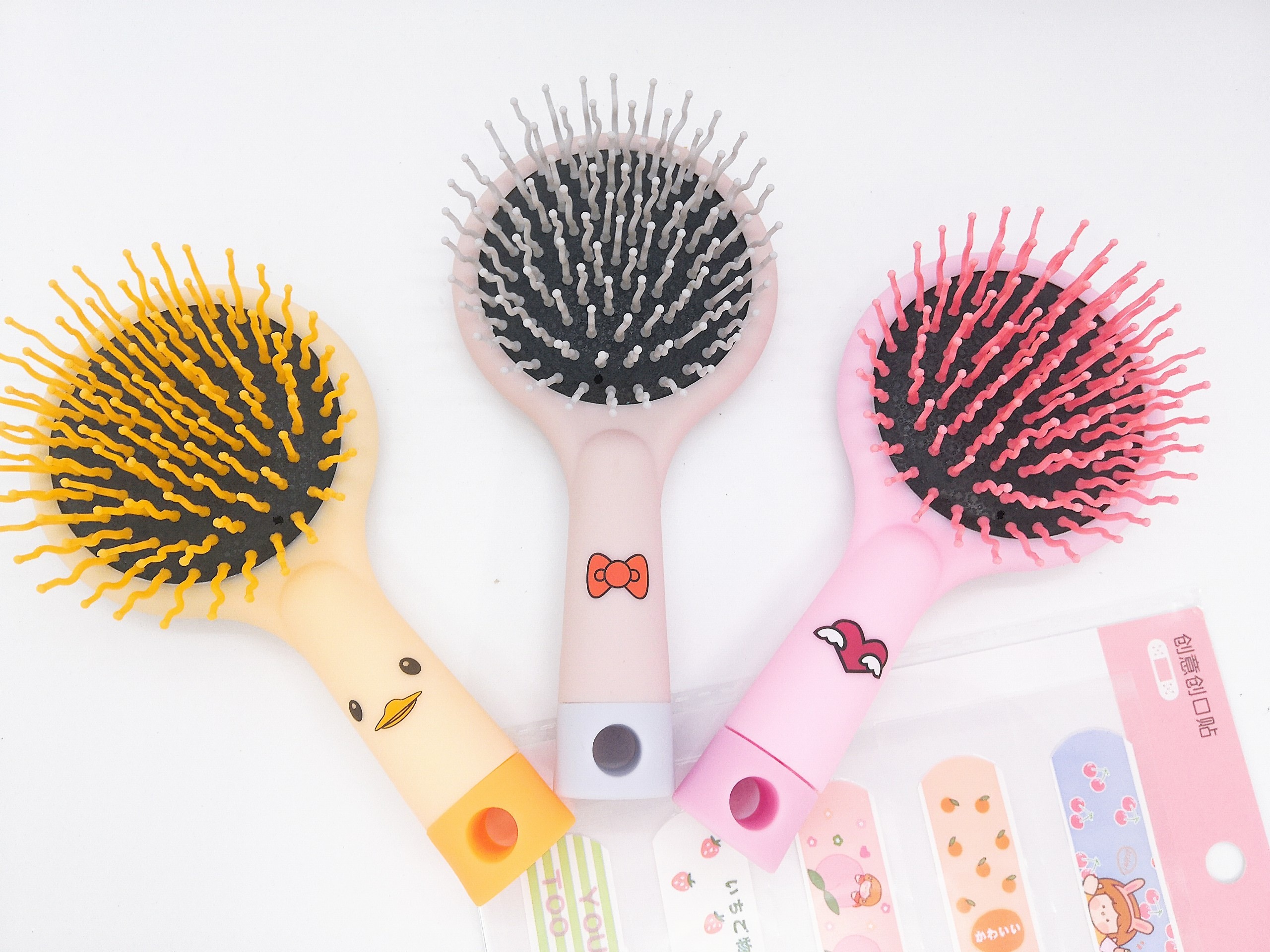 Lược mini cầm tay kèm gương xinh xắn