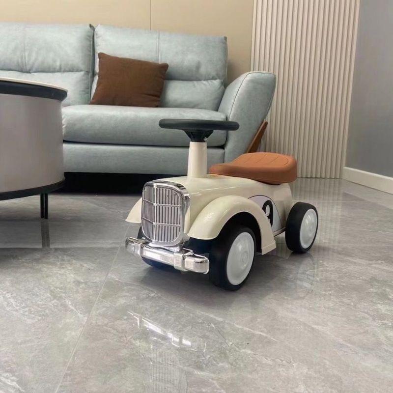 Xe chòi chân ô tô cổ điển cho bé có nhạc đèn