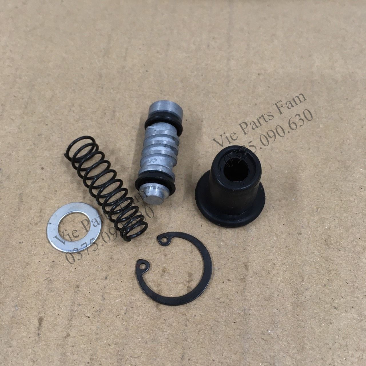 Cuppen/ Ty ben/ cốt ben thắng đĩa sau Suzuki Axelo, Satria, Raider, X-Bike, Viva (Hàng tốt)