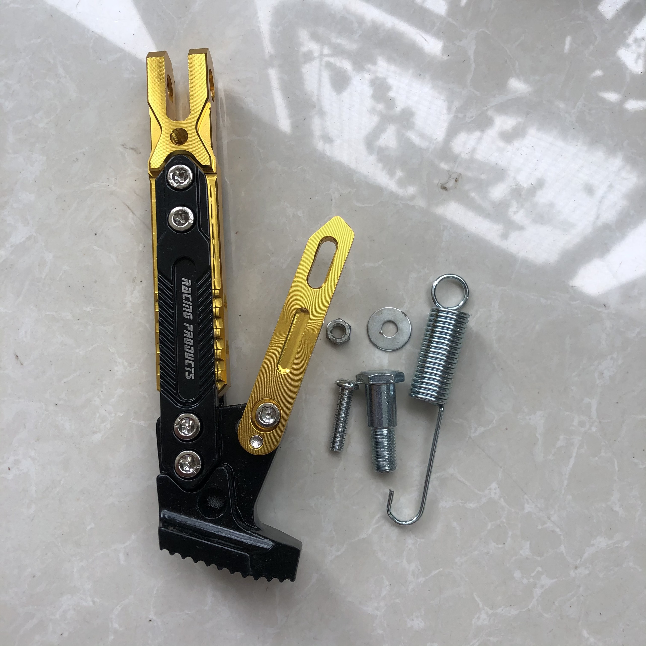  Chân chống nghiêng CNC dành cho mọi xe máy có thể tăng chỉnh ngắn dài cao cấp kiểu Rizoma phụ kiện đi kèm gồm 1 lò xo 1 ốc 