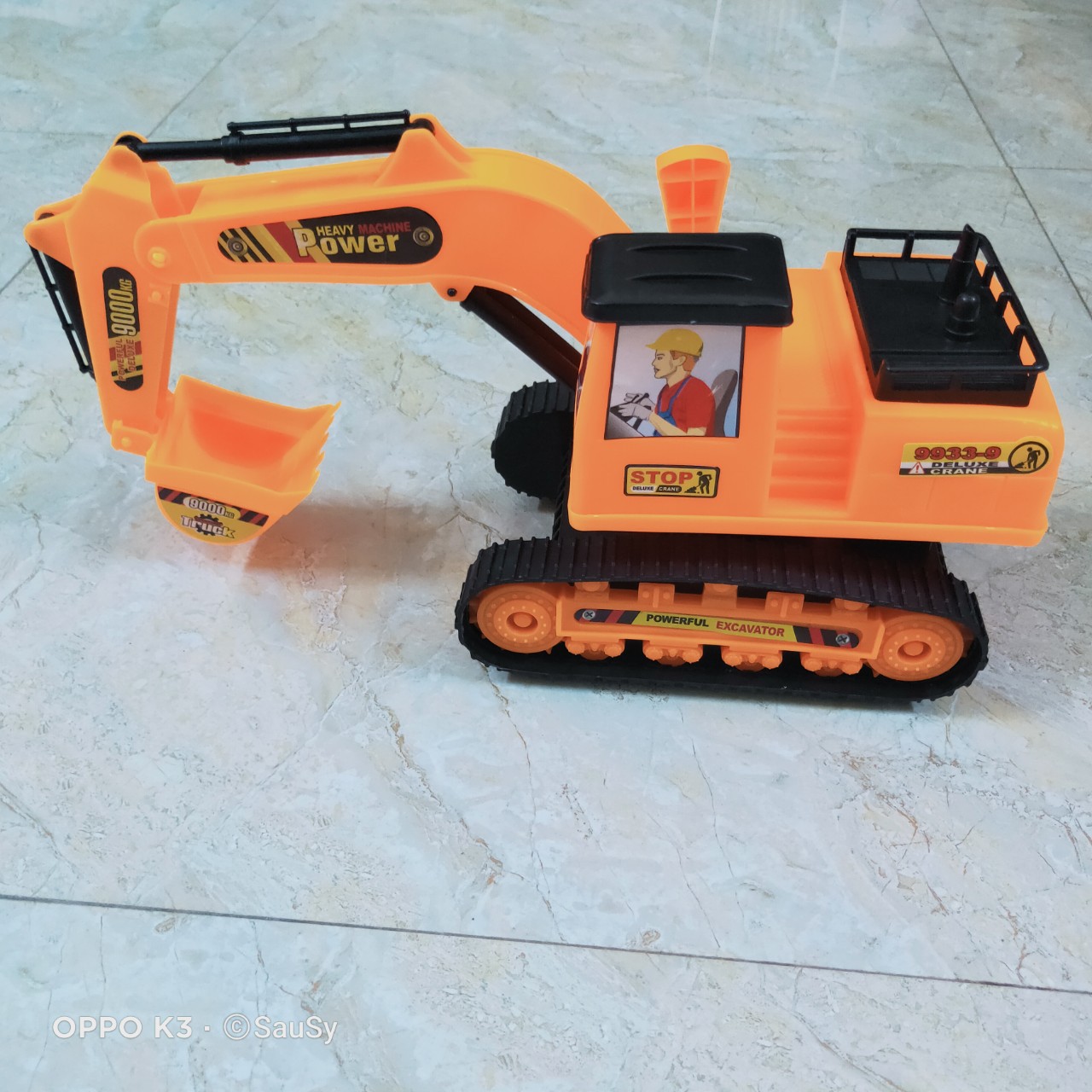 Đồ chơi Xe Máy xúc to POWER hình người lái (Có thể nâng hạ tay và xoay xe)