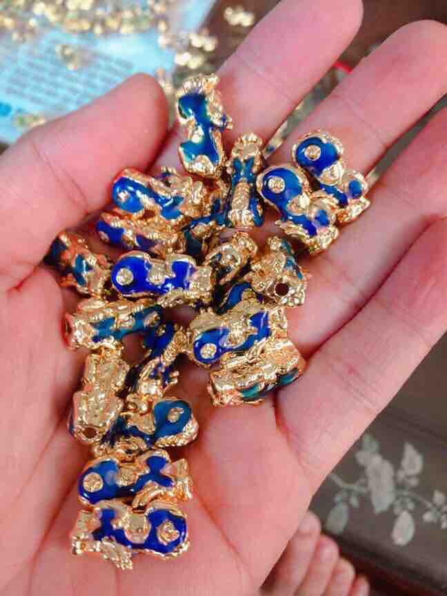 Tỳ hưu đổi màu cõng kim tiền mang tài lộc , may mắn