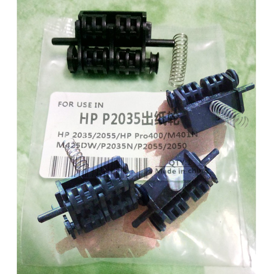 Máy in laser hp 2055 canon lbp6600 6650 668 - con lăn ra giấy hp 2055 canon 6650