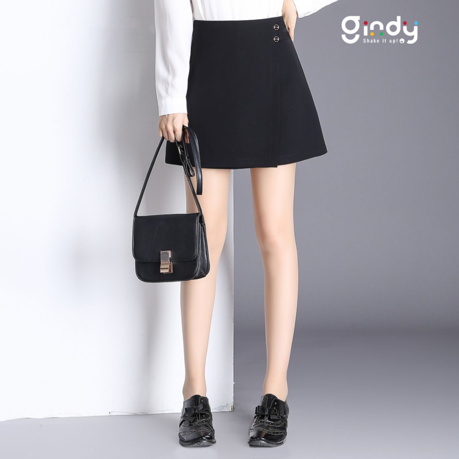 Chân váy nữ chữ A GINDY chân váy ngắn phối cúc đáp tà lệch thời trang công sở V20011