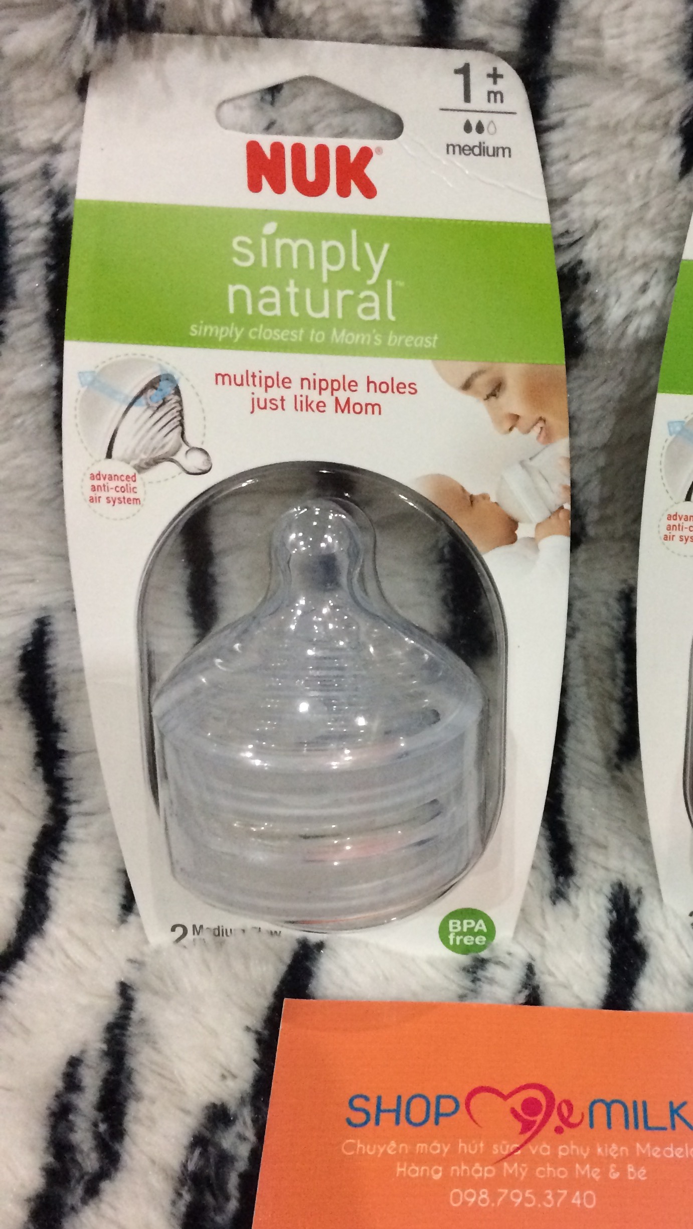 Núm ti bình sữa Nuk Simply Natural 6 lỗ cho bé từ 1 - 6 tháng tuổi