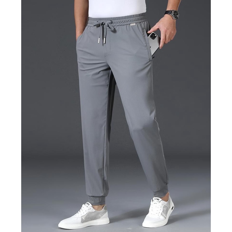 Quần jogger thể thao nam vải thun Poly co giãn phong cách hàn quốc